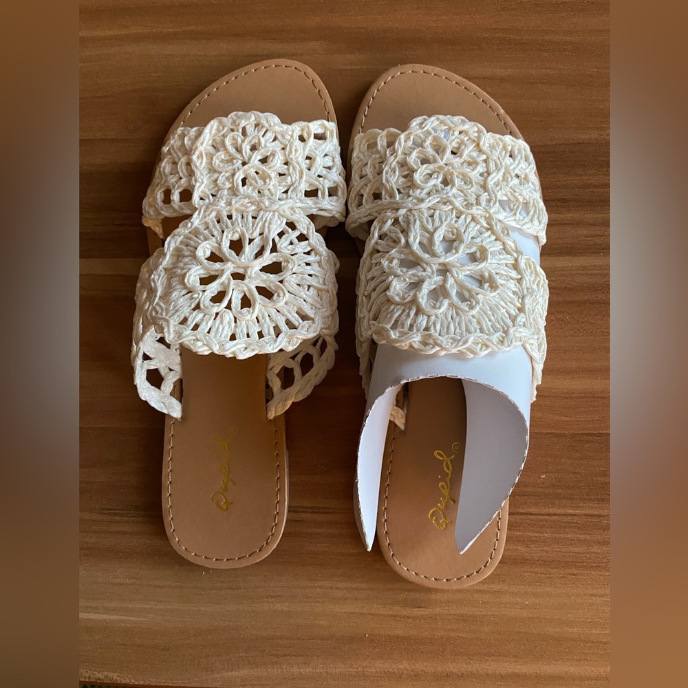 White crocheted sandals.